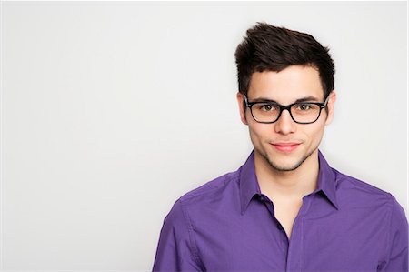 portrait young man white background - Close up of serious man's face Stock Photo - Premium Royalty-Free, Code: 649-04827463