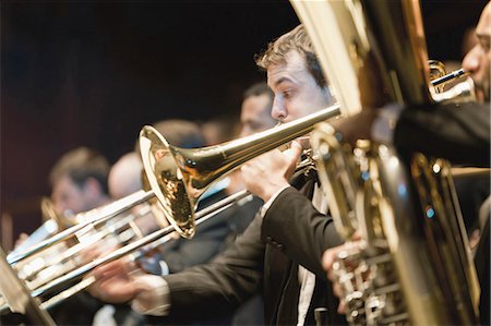 simsearch:649-06305080,k - Brass section in orchestra Fotografie stock - Premium Royalty-Free, Codice: 649-05555714