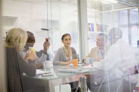 people working together at table - Business people talking in meeting Stock Photo - Premium Royalty-Free, Code: 649-05648576