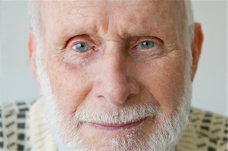 senior on white - Close up of older man's face Stock Photo - Premium Royalty-Free, Code: 649-05656963