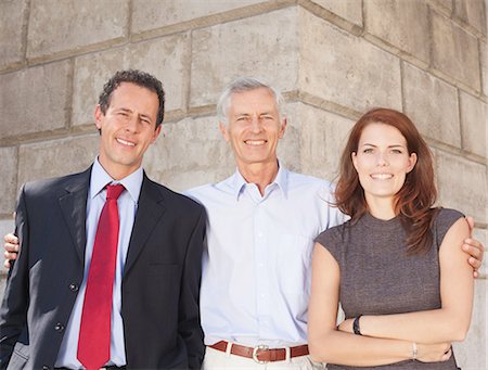 Business people standing together Stock Photo - Premium Royalty-Free, Code: 649-05657010