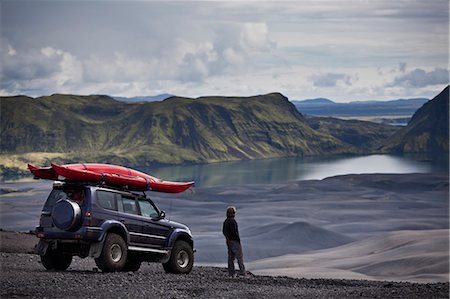 fun adventures weekend - Man with Jeep admiring rural landscape Stock Photo - Premium Royalty-Free, Code: 649-05657622