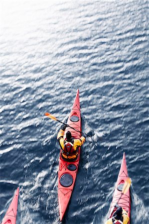 Aerial view of kayakers in water Stock Photo - Premium Royalty-Free, Code: 649-05657733