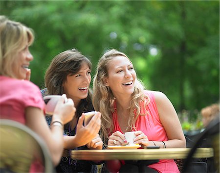 fun young woman thinking - Women having coffee at sidewalk cafe Stock Photo - Premium Royalty-Free, Code: 649-05657884