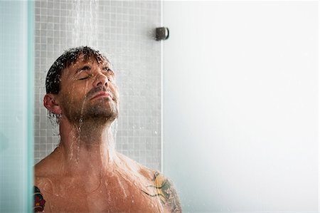 douche - Man washing his hair in shower Foto de stock - Sin royalties Premium, Código: 649-05658180