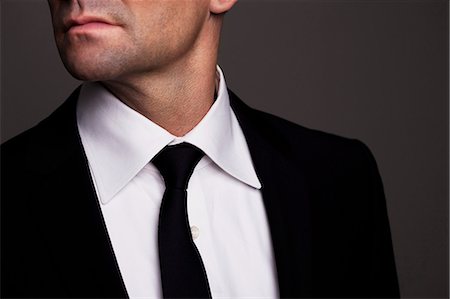 Close up of businessman's tie Foto de stock - Sin royalties Premium, Código: 649-05658214