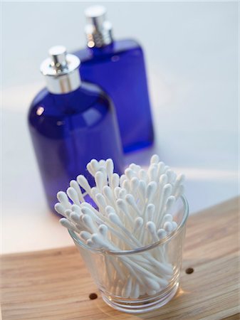 still life and elegant - Close up of cotton buds and perfume Stock Photo - Premium Royalty-Free, Code: 649-05658417