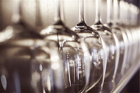 rows of wine glasses - Close up of empty wine glasses Stock Photo - Premium Royalty-Free, Code: 649-05800860