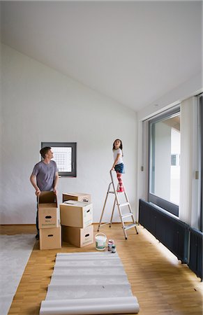 escalera de mano - Father and daughter painting new house Foto de stock - Sin royalties Premium, Código: 649-05801074