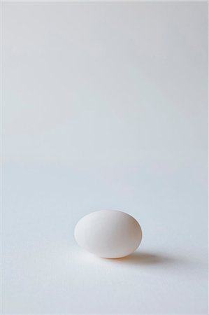 development concepts - Close up of egg on countertop Stock Photo - Premium Royalty-Free, Code: 649-05801473