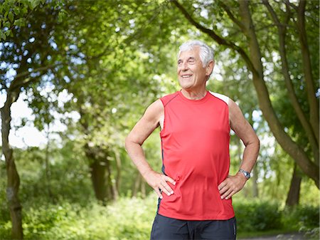 denmark park - Smiling older man standing outside Stock Photo - Premium Royalty-Free, Code: 649-05801858