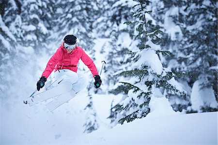 simsearch:6122-07707282,k - Skier jumping on snowy slope Stock Photo - Premium Royalty-Free, Code: 649-05801875