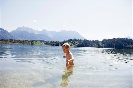 swimmer boys - Boy swimming in lake Stock Photo - Premium Royalty-Free, Code: 649-05802120