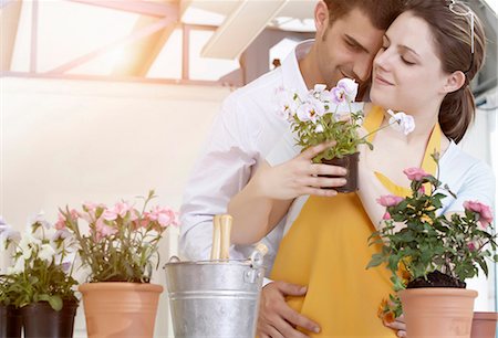 potted plants italy - Couple de-potting plants together Stock Photo - Premium Royalty-Free, Code: 649-05802404