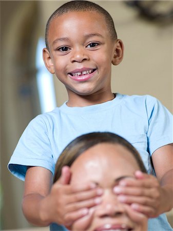 simsearch:649-03291747,k - Smiling boy covering mothers eyes Stock Photo - Premium Royalty-Free, Code: 649-05819965