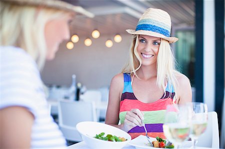 friends in a cafe - Women eating together in cafe Stock Photo - Premium Royalty-Free, Code: 649-05820194