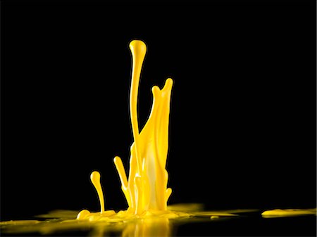 devastation - Close up of drop of paint splashing Stock Photo - Premium Royalty-Free, Code: 649-05820241