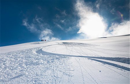 Ski and snowboard tracks on snowy hill Stock Photo - Premium Royalty-Free, Code: 649-05820419