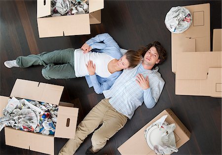 Couple laying together on floor Stock Photo - Premium Royalty-Free, Code: 649-05820537