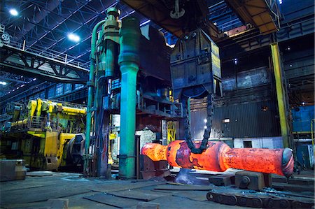 steel mill - Glowing machinery in steel forge Stock Photo - Premium Royalty-Free, Code: 649-05820725