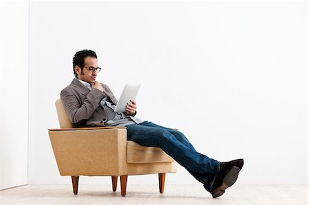 Businessman using tablet computer Foto de stock - Sin royalties Premium, Código: 649-05820792