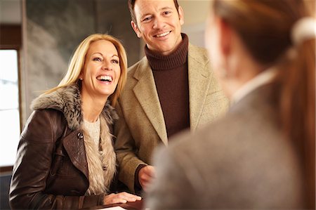 europe travelling - Couple checking in to hotel Stock Photo - Premium Royalty-Free, Code: 649-05821047