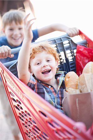 friends and shopping and happy - Children playing with shopping cart Stock Photo - Premium Royalty-Free, Code: 649-05949575