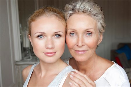 daughter and older mom - Mother and daughter smiling together Stock Photo - Premium Royalty-Free, Code: 649-05949675