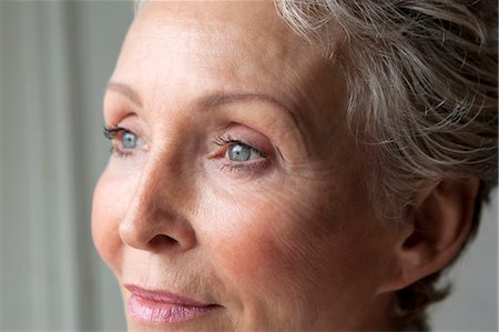 senior woman head and shoulders not smiling - Close up of older womans eyes Stock Photo - Premium Royalty-Free, Code: 649-05949671
