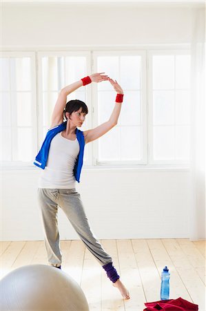 dancers - Woman stretching during workout Stock Photo - Premium Royalty-Free, Code: 649-05949780