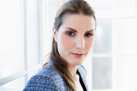 portrait of young woman caucasian one person - Close up of businesswomans face Stock Photo - Premium Royalty-Free, Code: 649-05949814