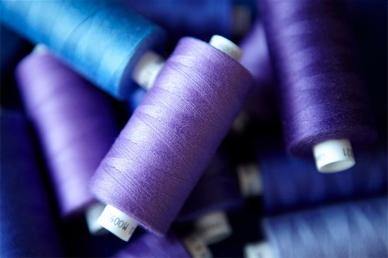 Close up of blue spools of thread Foto de stock - Sin royalties Premium, Código de la imagen: 649-05950260