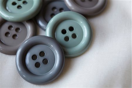 Close up of grey buttons Stock Photo - Premium Royalty-Free, Code: 649-05950263