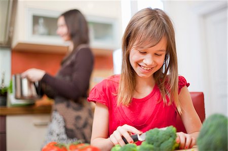 Mother and daughter cooking together Stock Photo - Premium Royalty-Free, Code: 649-05950583