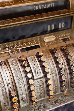 Close up of antique cash register Fotografie stock - Premium Royalty-Free, Codice: 649-05951172