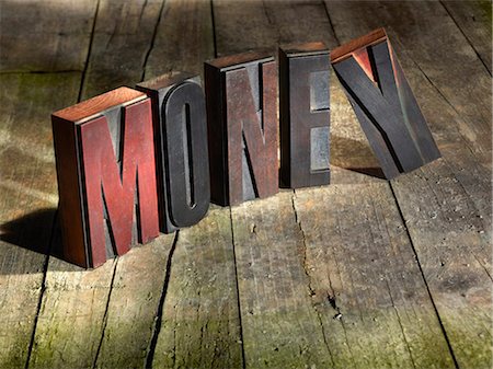 Wooden blocks spelling money Stock Photo - Premium Royalty-Free, Code: 649-05951247