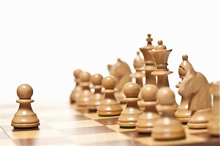 Close up of chess pieces on board Stock Photo - Premium Royalty-Free, Code: 649-05951266