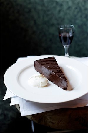 port wine - Plate of chocolate cake with whip cream Stock Photo - Premium Royalty-Free, Code: 649-06000474