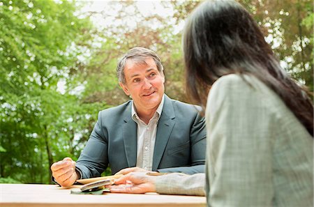 south downs - Business people talking in meeting Fotografie stock - Premium Royalty-Free, Codice: 649-06000587