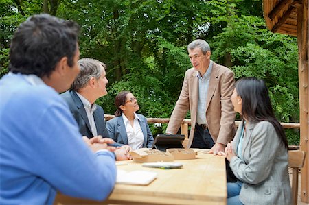 simsearch:649-03769404,k - Business people talking in meeting Stock Photo - Premium Royalty-Free, Code: 649-06000592