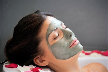 spa eyes closed - Woman with face mask relaxing in bath Stock Photo - Premium Royalty-Free, Code: 649-06000628