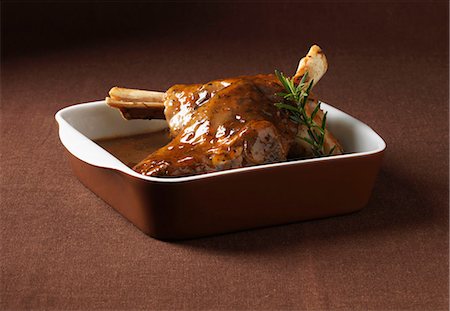 Close up of dish of lamb shanks Fotografie stock - Premium Royalty-Free, Codice: 649-06001277