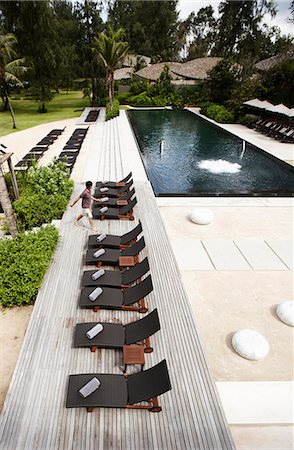 row of beach chairs - Aerial view of lawn chairs on deck Stock Photo - Premium Royalty-Free, Code: 649-06001729