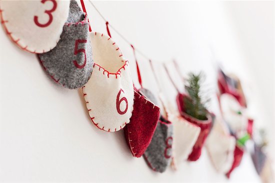 Close up of advent calendar on wall Stock Photo - Premium Royalty-Free, Image code: 649-06001800