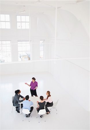 elevated view of a confident businesswoman - Businesswoman giving presentation Stock Photo - Premium Royalty-Free, Code: 649-06001896