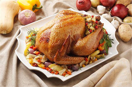 Close up of roast chicken and vegetables Stock Photo - Premium Royalty-Free, Code: 649-06001988