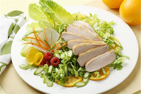duck not waterfowl - Plate of pork and salad Stock Photo - Premium Royalty-Free, Code: 649-06001996