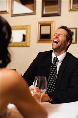 dining celebration - Couple having dinner in restaurant Foto de stock - Sin royalties Premium, Código: 649-06040271