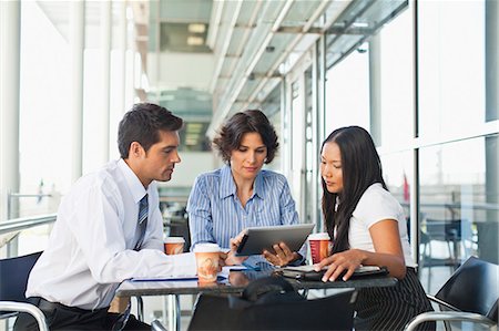 simsearch:649-06717179,k - Business people working together in cafe Stock Photo - Premium Royalty-Free, Code: 649-06040605