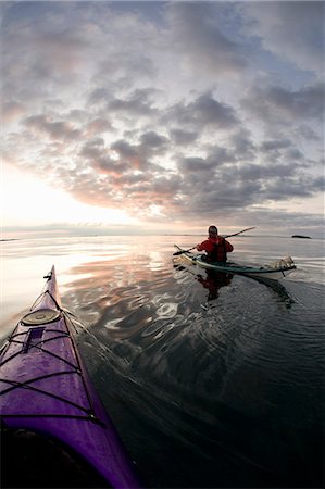 sunset adventure - People kayaking on still lake Stock Photo - Premium Royalty-Free, Code: 649-06040976